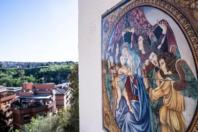 a painting on the side of a building at Holidays in Rome at Luigi's in Rome