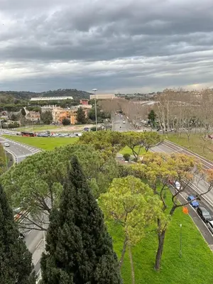 a view of a park with trees and a road at Apartment in the heart of Rome in Rome