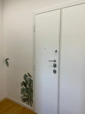 a white closet with a door in a room at Apartment in the heart of Rome in Rome