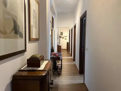 a hallway with a hallway leading to a room with a hallwayngthngthngthngth at Feel at home in Rome