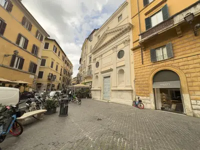 a cobblestone street in a city with buildings at Cozy 2BR Apartment near Piazza Navona in Rome