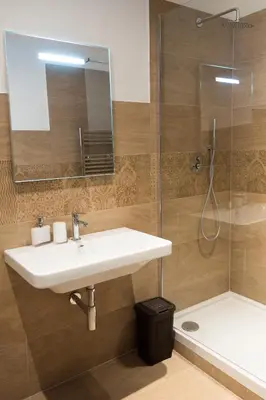 a bathroom with a sink and a shower at Campo Marzio Charming in Rome