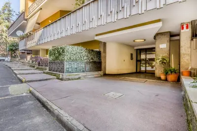 an empty parking lot in front of a building at Zampieri Loft in Rome