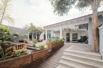 a home with a wooden deck with plants at Le Arcate, suite 1 Lavinia, suite 2 Lucilla in Rome