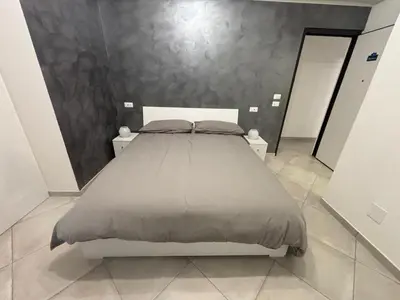 a bedroom with a large bed in a room at Guest House Vatican Room da Gabry in Rome