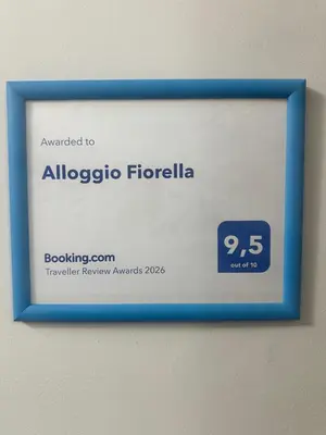 a framed sign for an albuquerque florida at Alloggio Fiorella in Rome