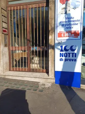 a dog in a door with a sign in it at Alessia C Locazione turistica in Rome