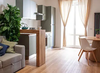 a living room with a couch and a table at Casa Monteverde near Trastevere and the city center in Rome