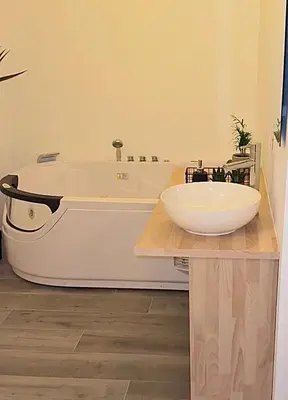 a bathroom with a sink and a bath tub at Residenza Piramide in Rome