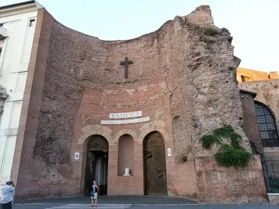 a church with a cross on the side of it at Domi 10 Apartment, Stazione Termini, Via Curtatone 12 in Rome