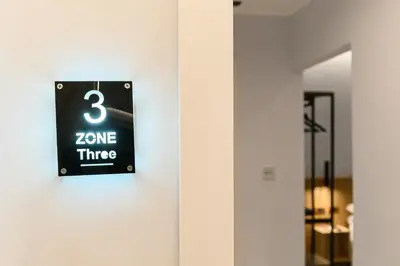 a sign on a wall with the number three on it at Arte di Roma - Guest House in Rome