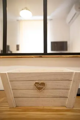 a dresser with a mirror on top of it at Casa Stefano at the Vatican comfort in the Heart of Rome in Rome