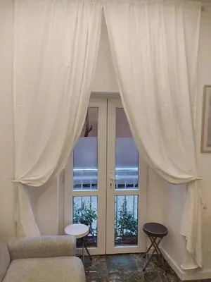 a living room with a couch and a window at Rome Center Bello Loft in Rome