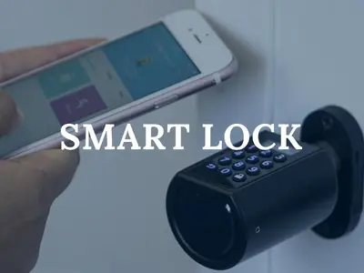 a hand holding a smart lock with a remote control at The Best Rent - Spacious Apartment Near Castel Sant’Angelo in Rome