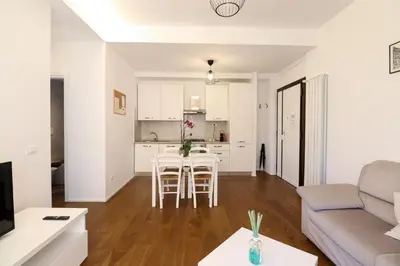 a living room with a couch and a table at Apartments Portuense in Rome