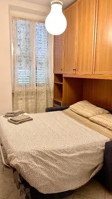 a hospital room with a bed with a window at Da Fedelisa in Rome