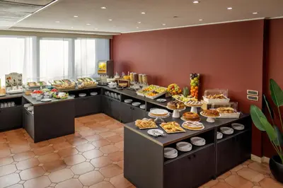 a buffet line with many different types of food at Hotel Marc'Aurelio in Rome