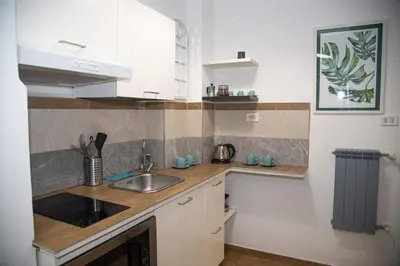 a small room with a bunk bed and a desk at Vatican - Risorgimento's Homies in Rome