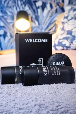 a black tube of mascara sitting next to a box at Mari & Lucio Bright Rome Apartment Sleeps 4 near Metro Basilica San Paolo- 4 Stops to Colosseum- Wi-Fi AC in Rome
