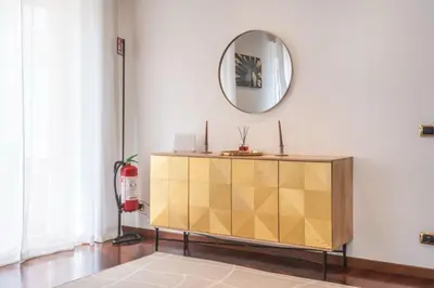 a dressing room with a mirror and a dresser at Susy's Lovely Flat near Trastevere in Rome