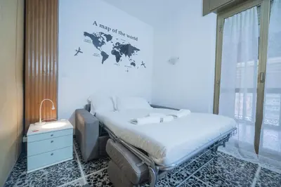 a hospital room with a bed and a window at Spacious and Bright 3BR Family Apartment in Rome