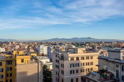 a view of a city with buildings at Penthouse Lux with Panoramic View in Rome