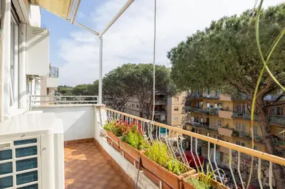 a balcony with a view of a city at Roman Retreat Near the Appian Way & Catacombs in Rome