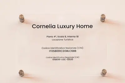 a sign that reads comedia luxury home on a wall at Vaticano-Cornelia Luxury Home in Rome