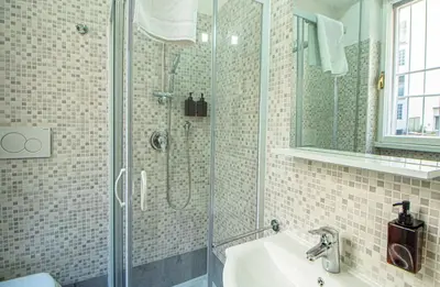 a bathroom with a shower and a sink at RHome 34 in Rome