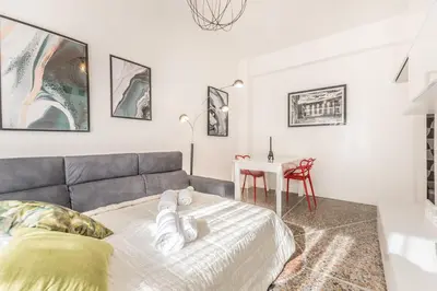 a living room with a couch and a table at Asinari Retreat in Rome