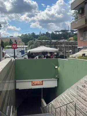 a building with a citgo sign on the side of it at Vatican Time apartment in Rome