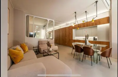 a living room with a couch and a table at Margutta Spagna Relais in Rome