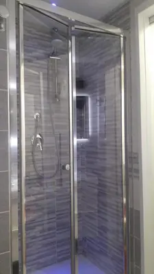 a shower with a glass door in a bathroom at Roma Centro appartamento in Rome