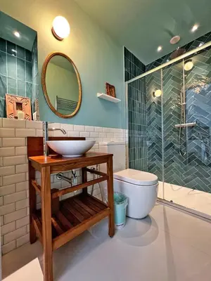 a bathroom with a sink and a shower and a toilet at Roma Parioli - Manfredi Suites appartamento in Rome