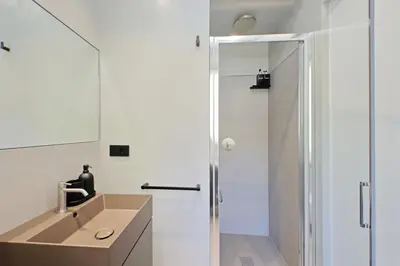 a bathroom with a sink and a shower at 4BNB - Charming Giuliana Apartment in Rome