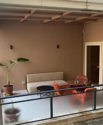 a living room with a couch and a table at ATEL Relais in Rome