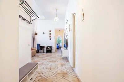 a dining room with a table and chairs at Blu Colombo in Rome