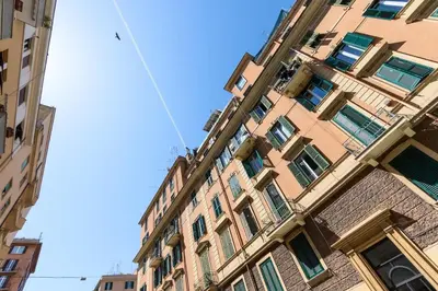 a tall building with windows on the side of it at Roma MetroB Apartment in Rome