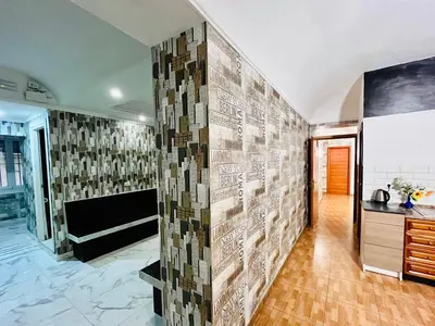 a large mural of a world map on a wall at Beauty Holidays in Rome