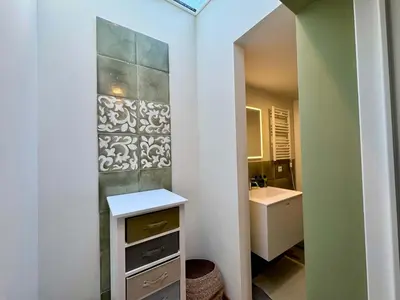 a bathroom with a sink and a mirror at Caracalla Loft in Rome