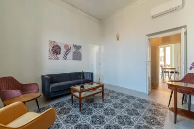 a living room with a couch and a table at Dante's View - Pretty Homes in Rome