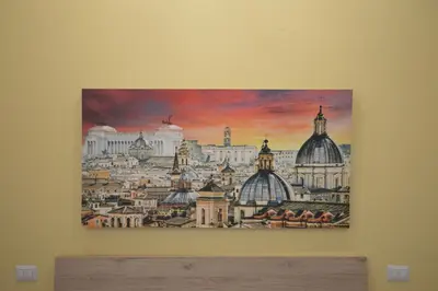 a painting of a city skyline on a wall at San Remo Apartment in Rome