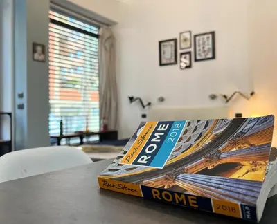 a book sitting on top of a table at Loft Lumineux à Trastevere in Rome