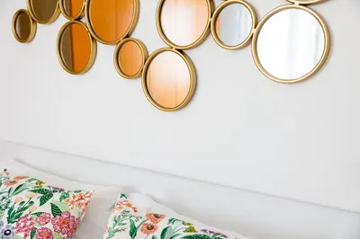 a group of sunglasses hanging on a wall at Maffis House in Rome