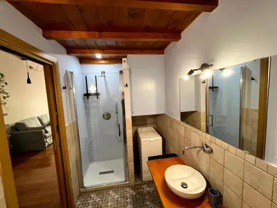 a bathroom with a sink and a toilet at Nel cuore di San Lorenzo in Rome