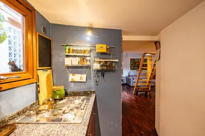 a kitchen with a sink and a counter top at old town Holy Door of Santa Maria Maggiore in Rome