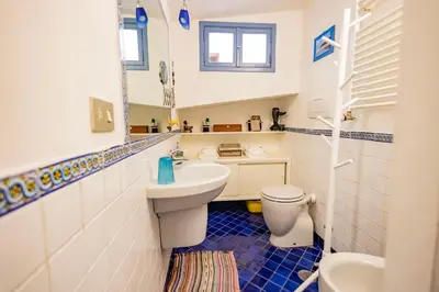 a bathroom with a sink and a toilet at old town Holy Door of Santa Maria Maggiore in Rome