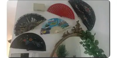 a group of plates and a mirror on a wall at Casa Serenissima Holiday Home Roma Barbara Bonanno in Rome