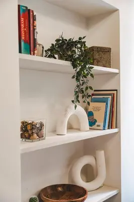 a shelf with a toilet and a plant on it at Fancy Colosseum - Best location in Rome