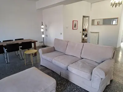 a living room with a couch and a table at Monti View Apartment in Rome